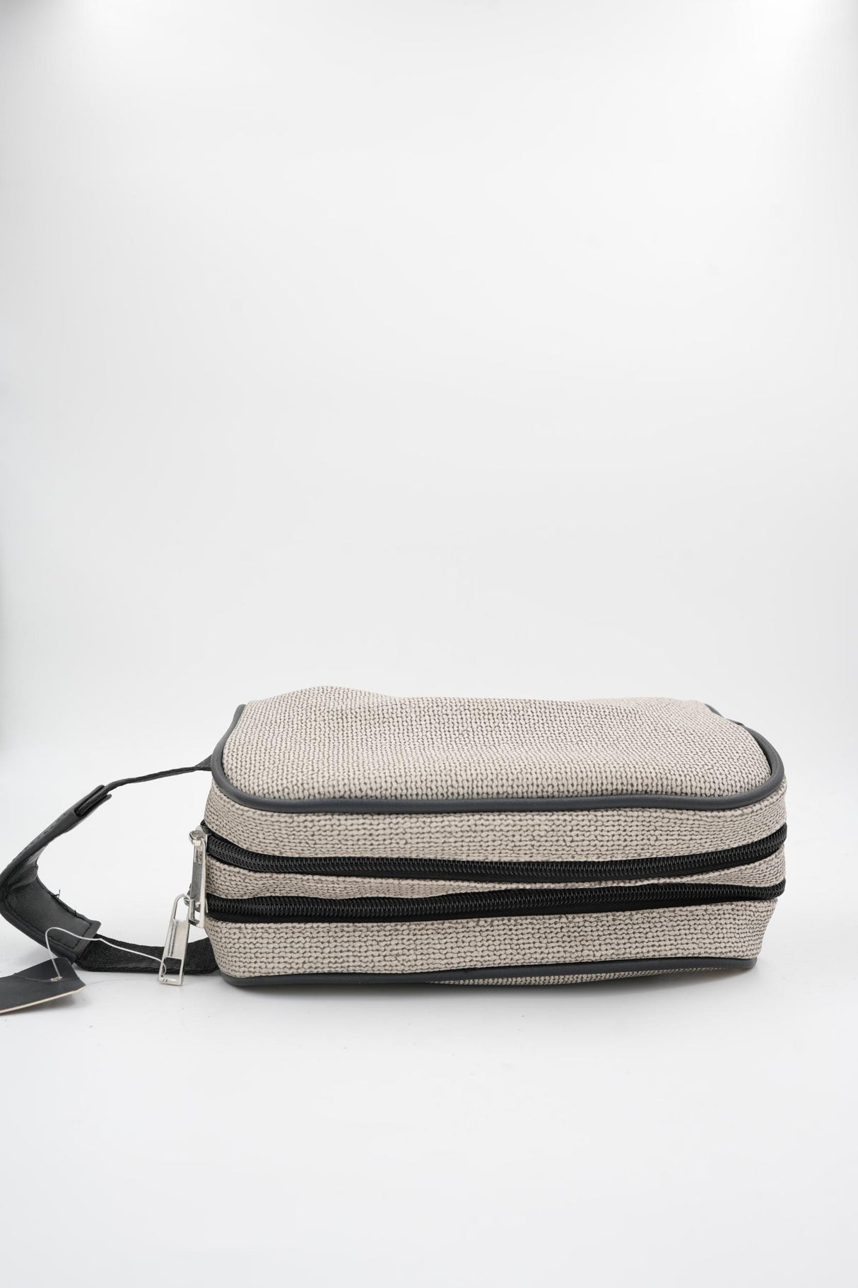 Dark grey zippered travel organizer bag for cosmetics or shaving kit