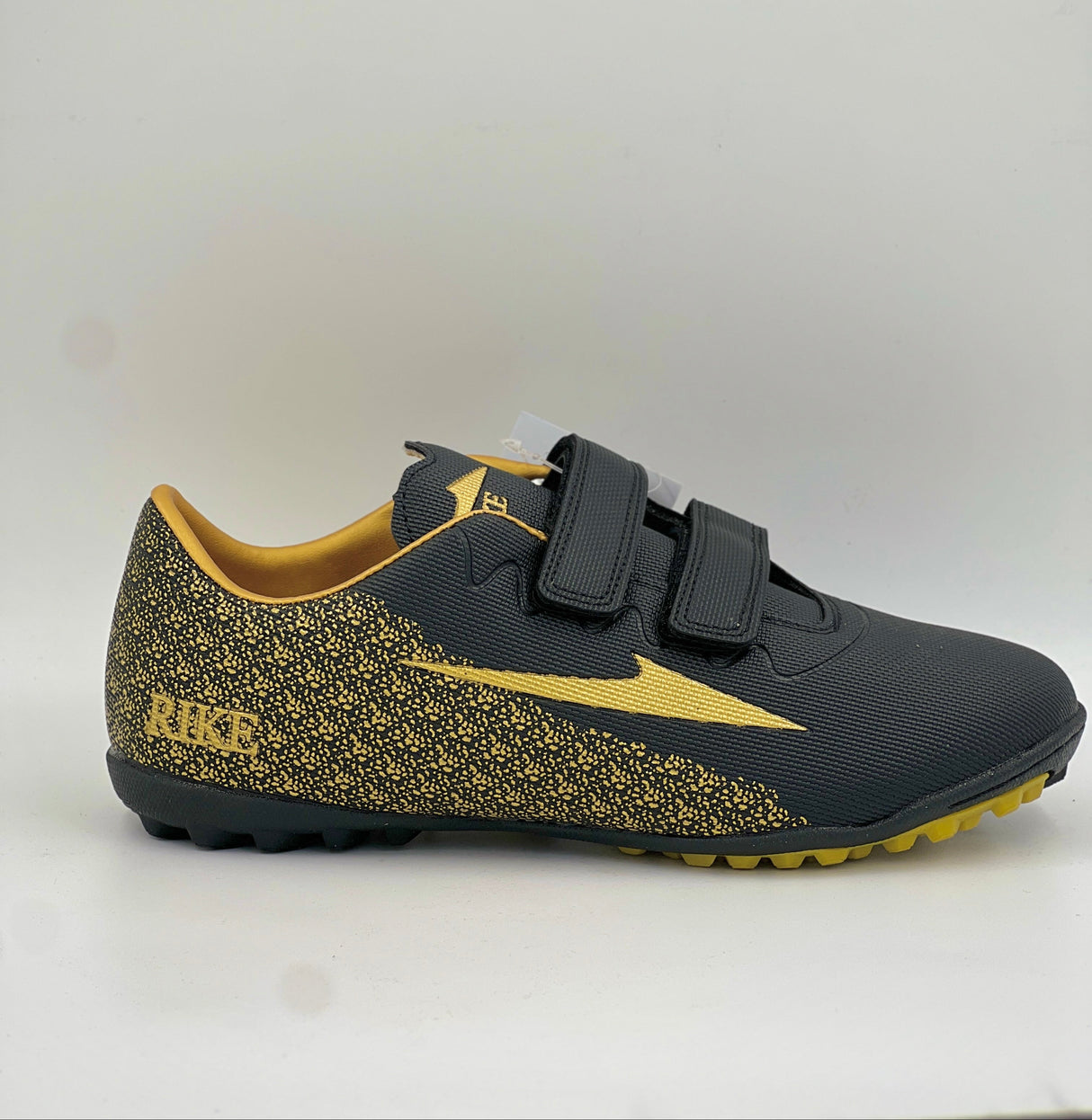 Rike black and gold quick-fasten turf shoes with non-slip sole