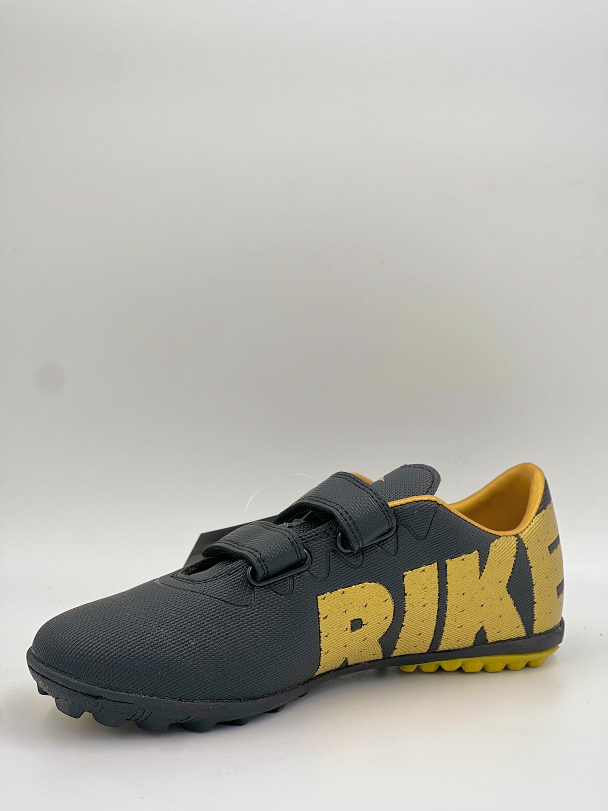 Durable Rike Velcro soccer shoes for artificial grass