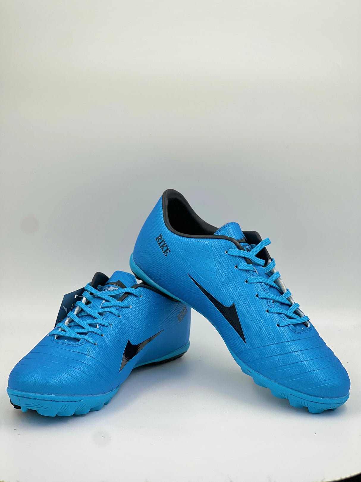 High-traction Rike soccer shoes for artificial grass