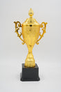 Premium winner award in polished gold on a black pedestal, 24 cm wide