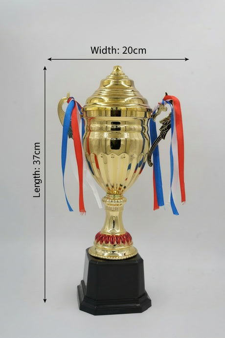 Large gold championship trophy cup with lid and red, white, and blue ribbons