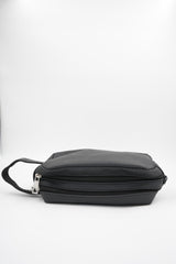 Durable black travel organizer pouch with white text logo