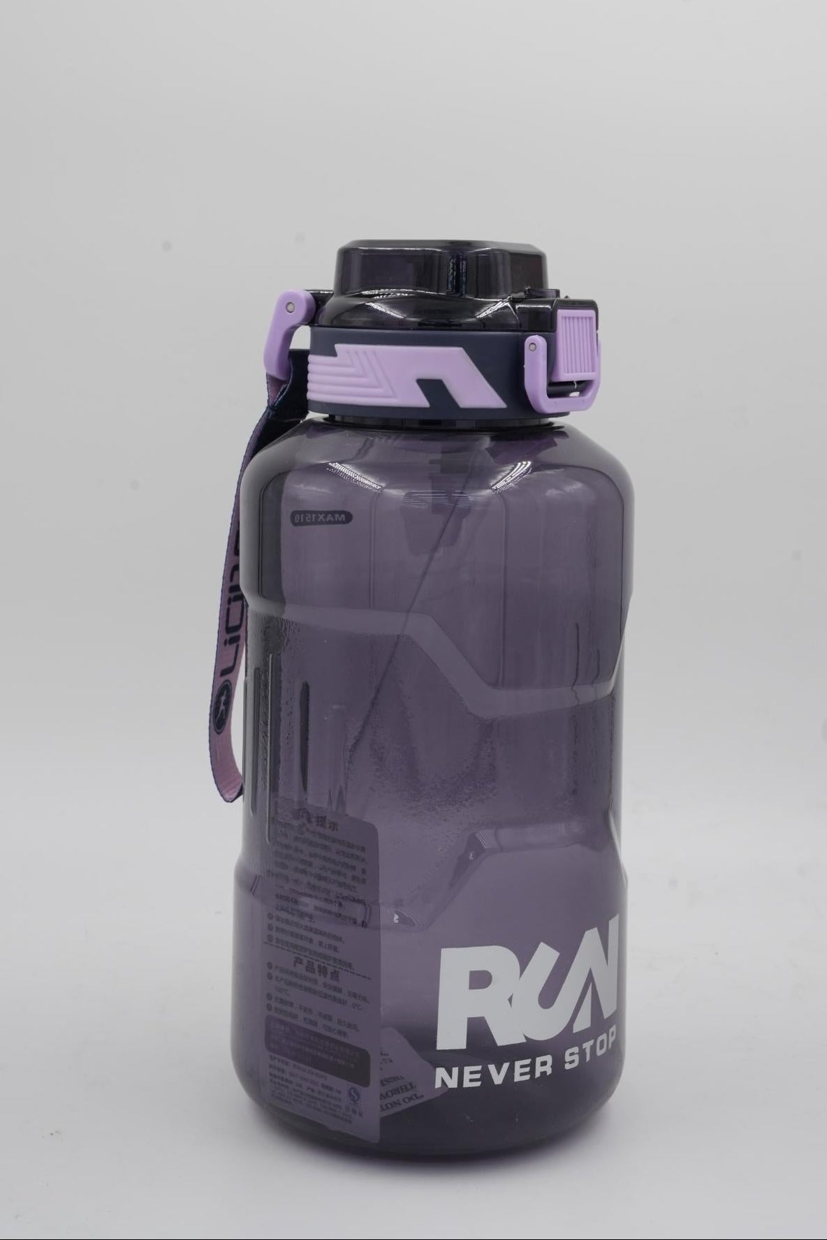 Large purple gym water jug with Run Never Stop logo