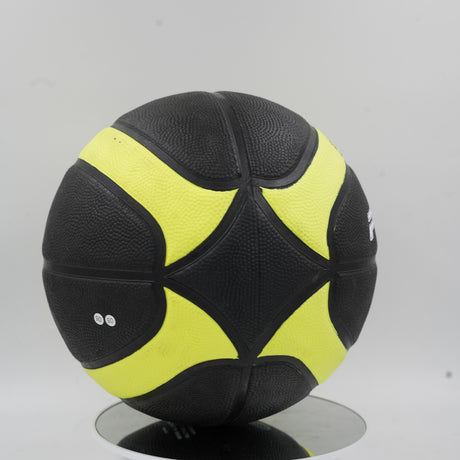 The Pride basketball showing its deep yellow channels and textured black surface designed for maximum grip and control.