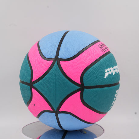 Close-up of the official size and weight text and the textured extra grip surface on the colorful Pride basketball.