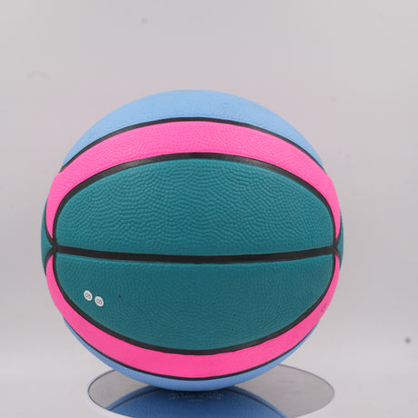 The multi-colored Pride basketball showing deep black channels and a premium pebbled surface designed for maximum court control.