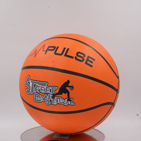 Front view of the classic orange Pulse Street Basketball featuring a black player graphic and strong textured grip.