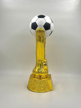 Shiny gold metallic football trophy featuring a classic paneled soccer ball.