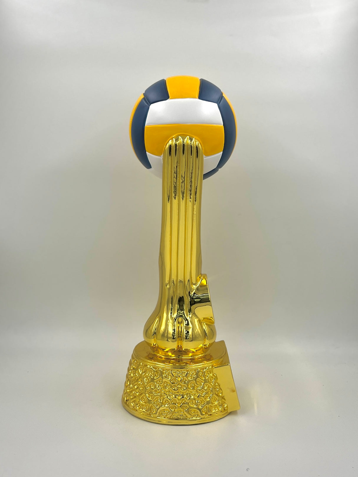 Award trophy for volleyball featuring a detailed, colored volleyball on a shiny gold resin stand.