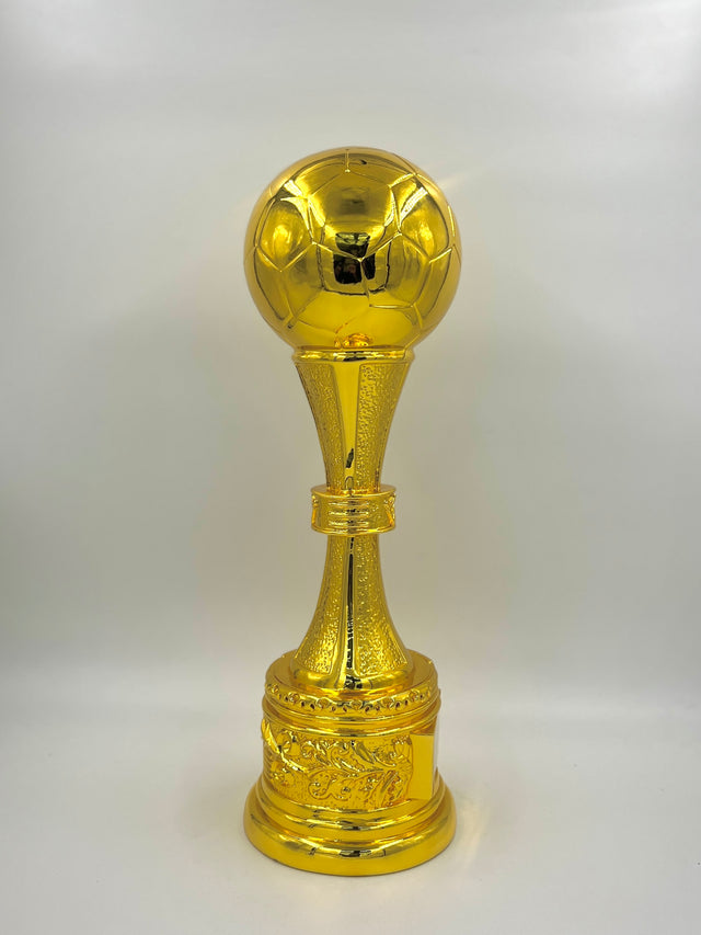Tall, ornate gold trophy with a smooth ball top on a white background.