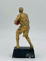 Detailed resin sports award, miniature size, depicting a male basketball player for MVP, tournament, or club recognition.