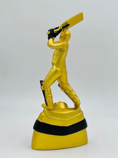Detailed gold figurine award for cricket MVP or Best Batsman, featuring a strong player posture and smooth base for engraving.