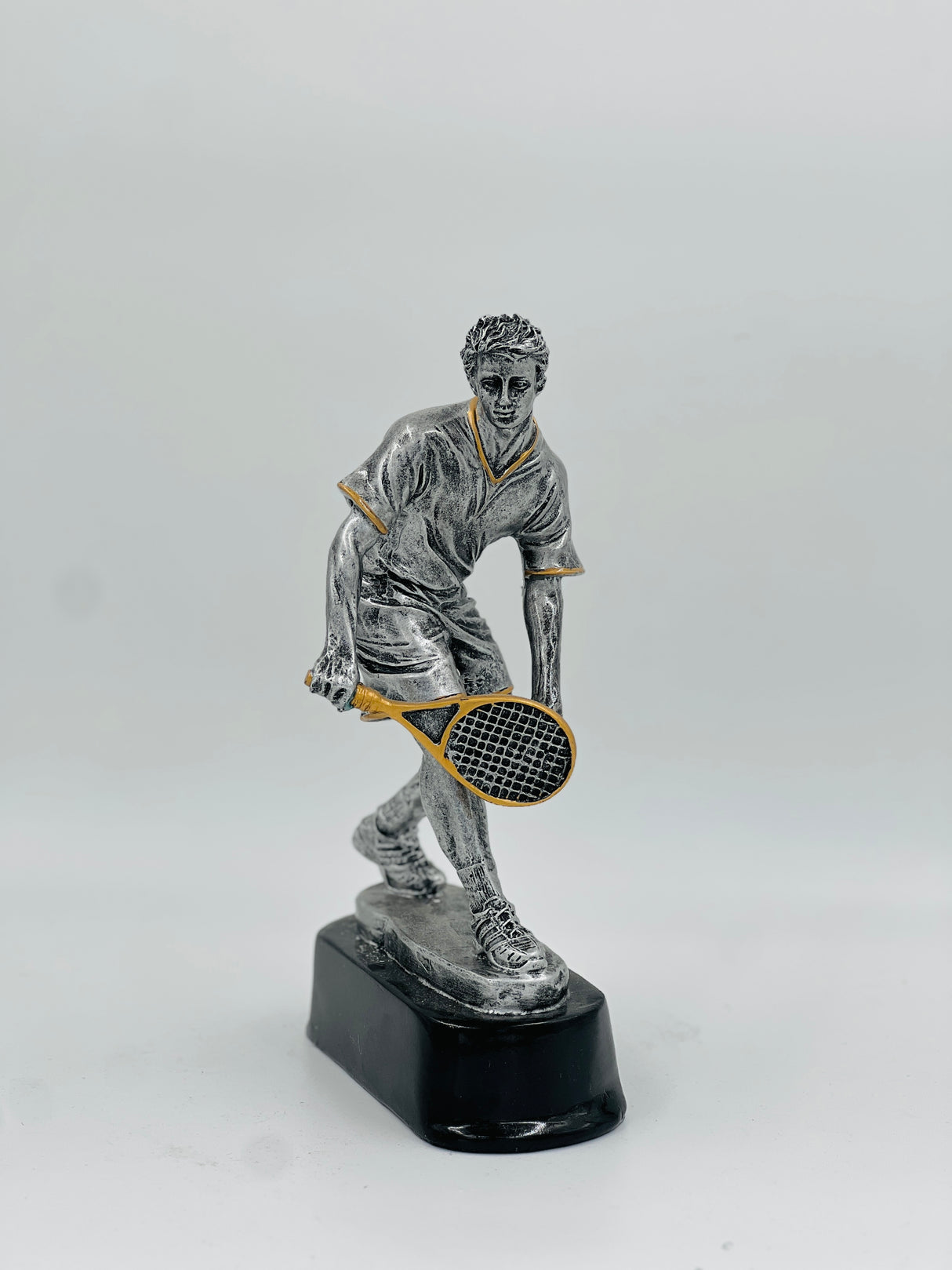 Premium silver tennis champion's trophy—a stunning award ideal for school leagues, club tournaments, or corporate events.