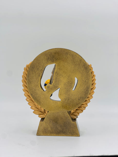 Detailed bronze award for Volleyball MVP or tournament winner, showcasing a dynamic spiking action pose.