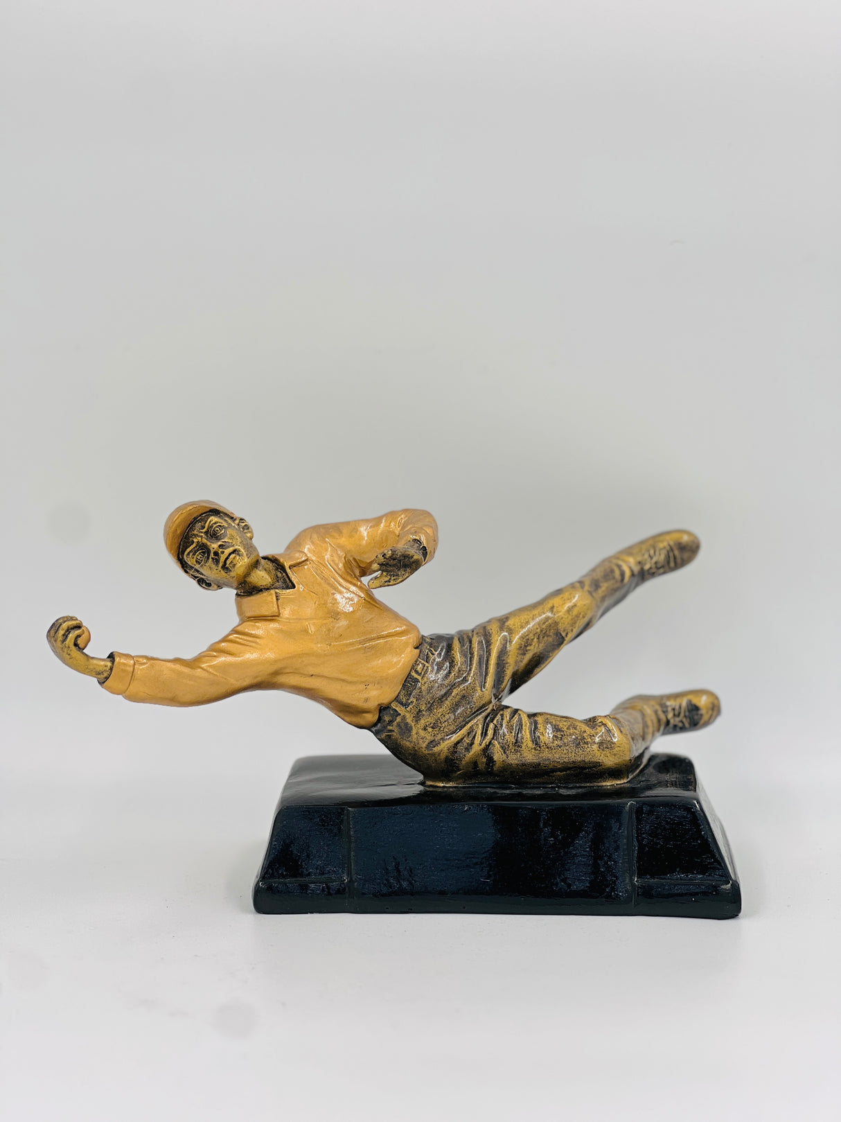 Unique bronze soccer champion's trophy—perfect for acknowledging aggressive play, diving goals, or crucial slide tackles.