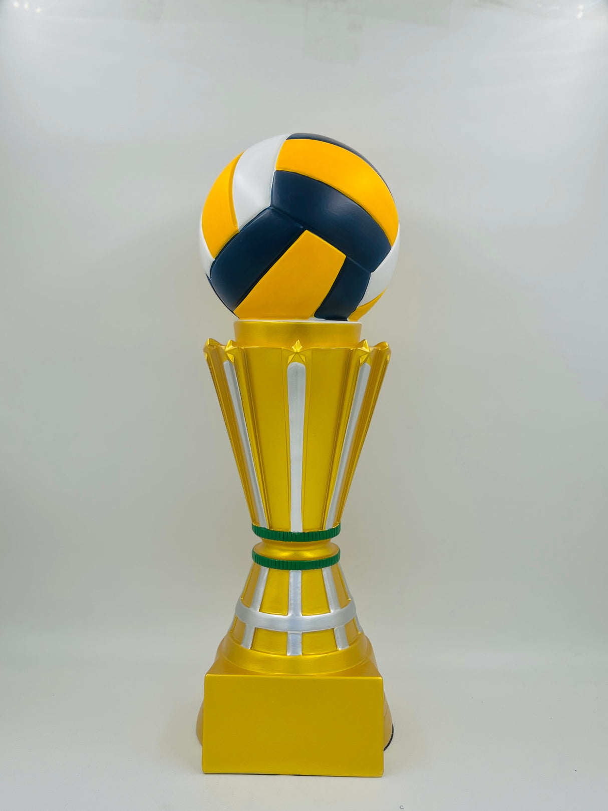 Tall, bright yellow resin volleyball/netball championship cup, ideal for league finals, school tournaments, or club winner recognition.