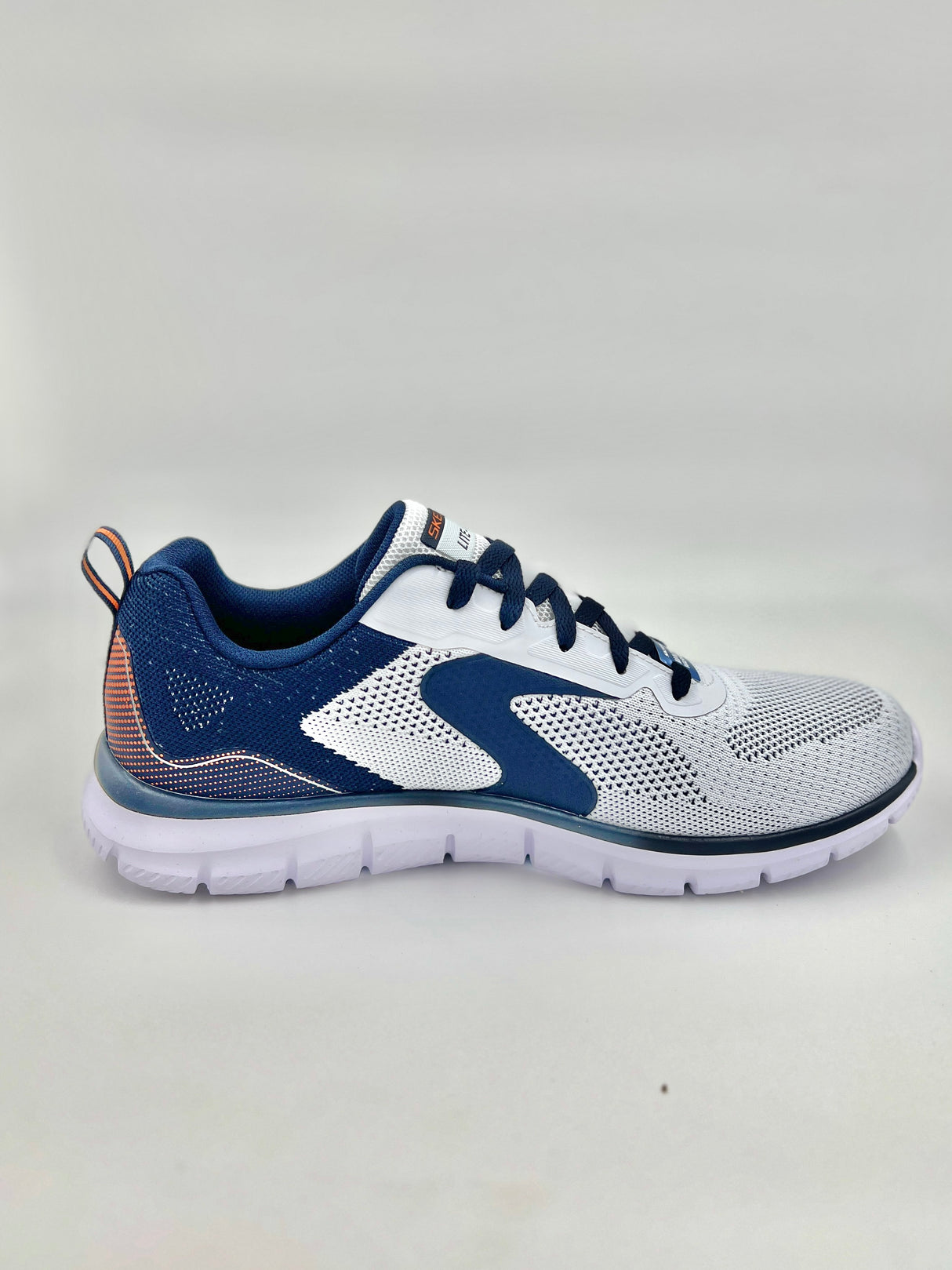 "White and blue athletic shoe with orange and silver accents, featuring a breathable mesh upper and a white cushioned sole, presented on a light gray background."