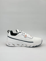 White sneaker with black accents on a light gray background