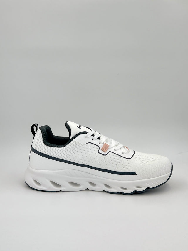 White sneaker with black accents on a light gray background