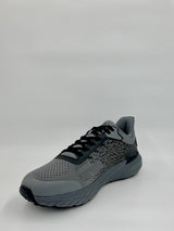Gray athletic shoe on a light gray background