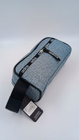 Compact, rectangular multi-purpose organizer pouch with a secure metal zipper and detailed stitching.