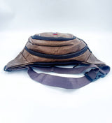 Durable belt bag in black with a strong zipper, ideal for hiking, festivals, or secure everyday travel.